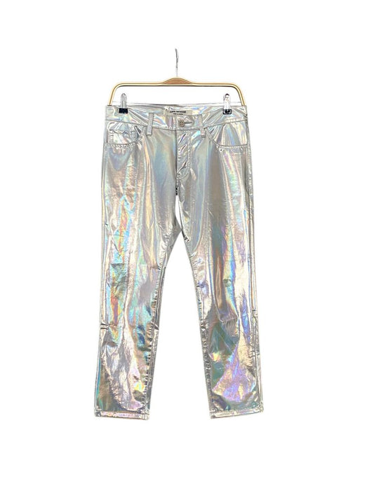 The Junya Watanabe Holographic Jeans make a bold fashion statement with their reflective, futuristic fabric and sleek, tailored fit. Blending avant-garde design with street-style edge, they offer a unique and daring twist on classic denim.