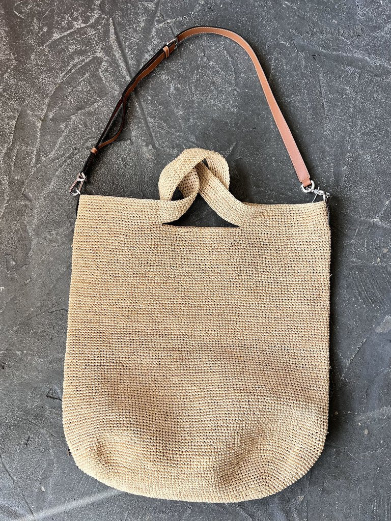 Katybird is a consignment boutique in Madrona, Seattle offering authentic Loewe Raffia & Calf cardigans, blouses, dresses, cashmere, sweaters, outerwear, accessories, handbags, shoes, and much more. Loewe Raffia & Calf Leather Ibiza Slit Bag